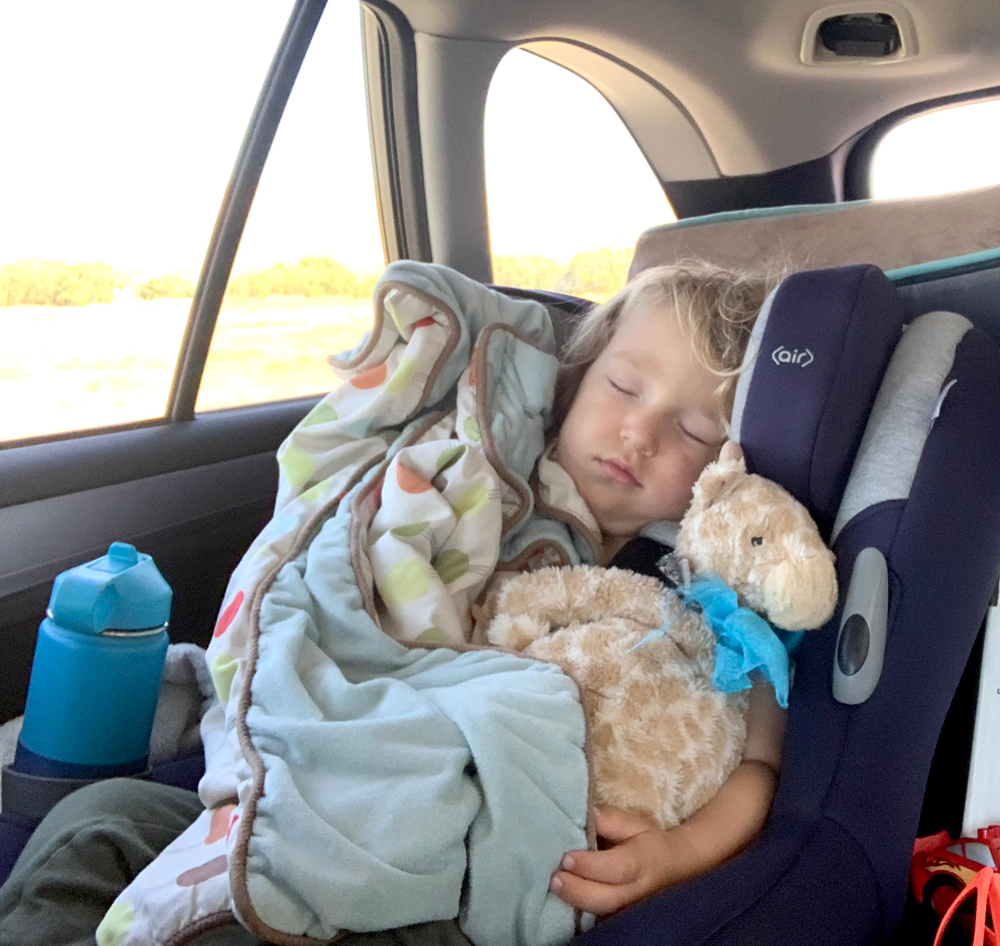 baby sleeping in carseat